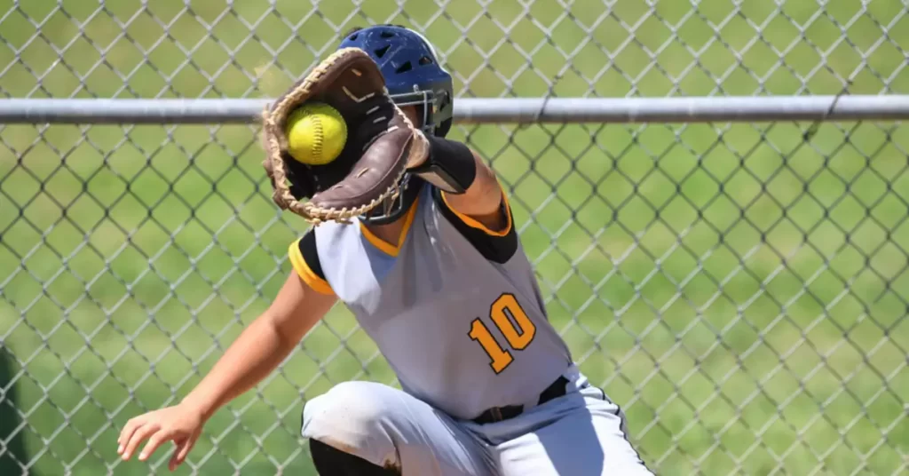 Catching a ball in fastpitch softball match